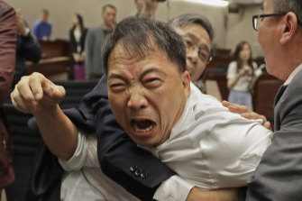 The extradition law amendments sparked mass protests and a brawl in Hong Kong's parliament earlier this month, leaving one politician in hospital.