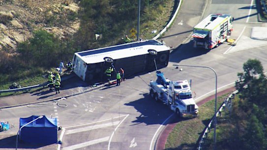 The bus was travelling on Wine Country Drive at Greta when it overturned.