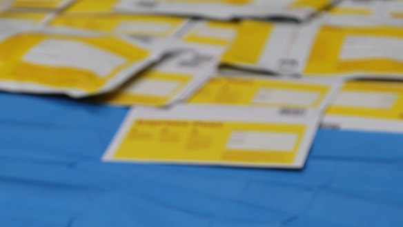 Police allegedly seized postage bags, scales and drugs from the premises at Callala Beach on the NSW South Coast.