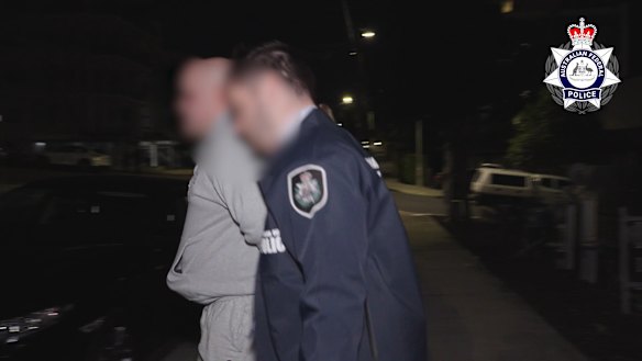 One of the arrests from the AFP raids that swept through Sydney on Tuesday.
