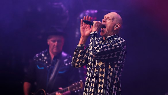 Keyboardist/guitarist Jim Moginie (left) and singer Peter Garrett at the Palais Theatre.