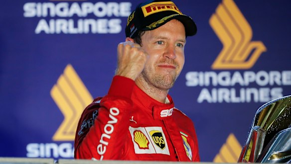 Sebastian Vettel celebrates a grand prix win for Ferrari last year.