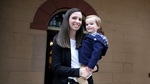 Labor MP Courtney Houssos with her son Arthur (aged 2) at State Parliament. 