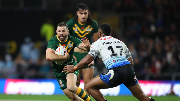 James Tedesco is put under pressure by King Vuniyayawa during the Rugby League World Cup match between Australia and Fiji.