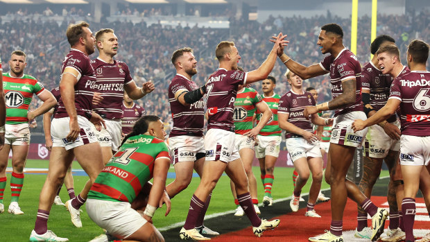 The Sea Eagles celebrate during their win over South Sydney in Las Vegas.