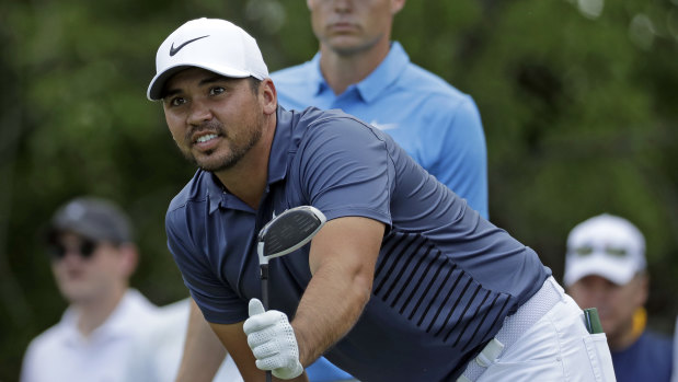 Intervention: Jason Day, seen here during last year's Wells Fargo Championship, has turned to an unusual method to help his troublesome back.