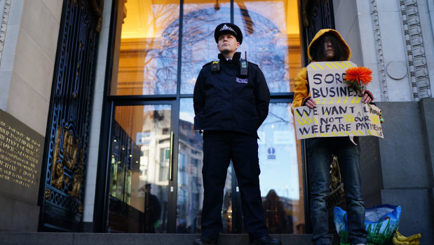 A police officer stands guard outside Australia House on The Strand. 