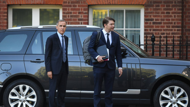 Mark Carney, governor of the Bank of England, left, departs from for a special Brexit 'No Deal' meeting of cabinet ministers at number 10 Downing Street in London on Thursday, September 13.