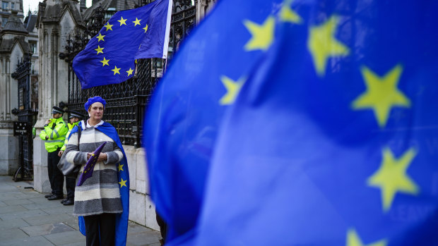 Anti-Brexit activists protest outside the Houses of Parliament on January 9 in London, England. MPs voted on the Withdrawal Agreement Bill.