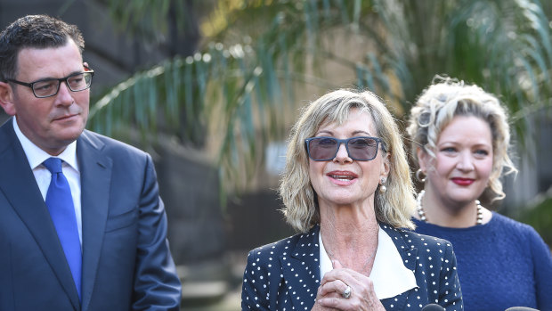  Olivia Newton-John (centre) with Premier Daniel Andrews and then health minister Jill Hennessy at the ONJ Centre in  2018. 