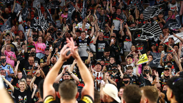 The Panthers celebrate with the crowd after victory in the 2021 NRL grand final match over the South Sydney Rabbitohs at Suncorp Stadium on Sunday.