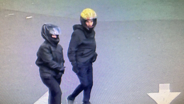 Detectives released photos of the two people believed to be behind a Burleigh Waters bank robbery. 