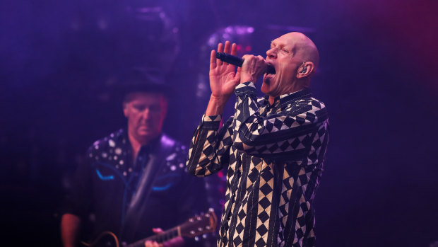 Keyboardist/guitarist Jim Moginie (left) and singer Peter Garrett at the Palais Theatre.