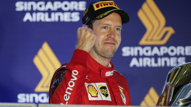Sebastian Vettel celebrates a grand prix win for Ferrari last year.