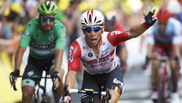 Australia's Caleb Ewan celebrates as he crosses the finish line.