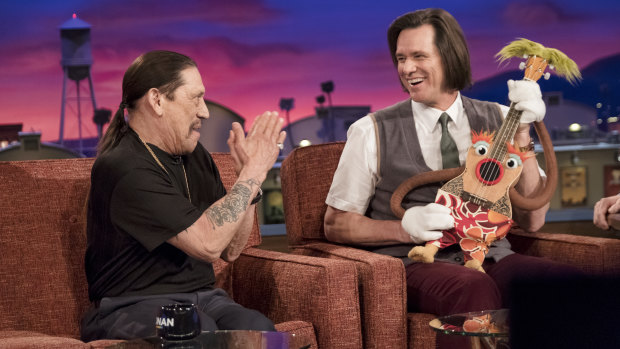 Jim Carrey as Jeff Pickles and Danny Trejo as himself in Kidding. 