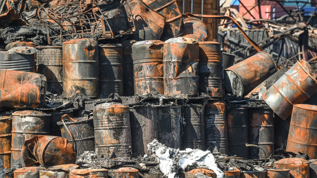 Burnt-out chemical drums after the fire at the West Footscray factory in 2018.