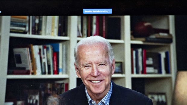 Former vice-president Joe Biden, 2020 Democratic presidential candidate, smiles during a virtual press briefing.