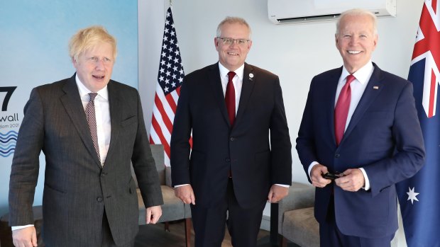 Britain’s Prime Minister Boris Johnson (left) with Prime Minister Scott Morrison and US President Joe Biden at the G7 summit. 