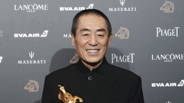 Chinese director Zhang Yimou holds his award for Best Director at the 55th Golden Horse Awards in Taipei, Taiwan. The latest film from Zhang has been dropped from the Berlin International Film Festival for "technical reasons." 