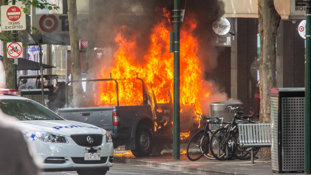 A general view of the scene on Bourke Street where a man has been shot by police after setting his car alight and stabbing multiple people in Melbourne's CBD