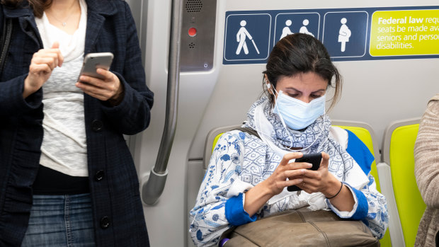 A commuter wears a protective mask in San Francisco.