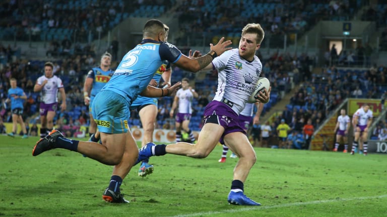 Storming ahead: Cameron Munster in action against the Titans.