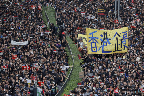 Tens of thousands of people protest in the streets of Hong Kong on June 19, 2019.
