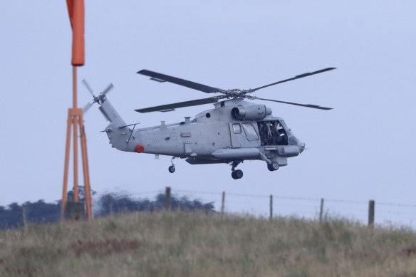 A helicopter takes off from Whakatane Airport as the mission to return victims of the White Island eruption begins.