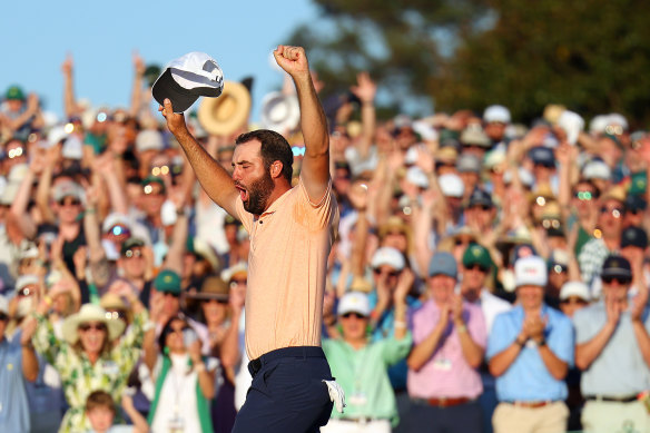 Scottie Scheffler celebrates on the 18th green.