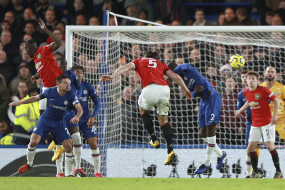 Harry Maguire scores United's second.