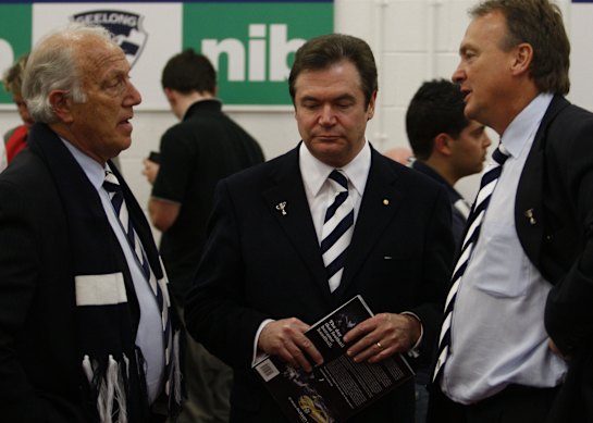 Then Cats president Frank Costa and CEO Brian Cook talk to former No.1 ticket holder Daryl Somers in the dressing rooms after the Cats lost the 2008 grand final.