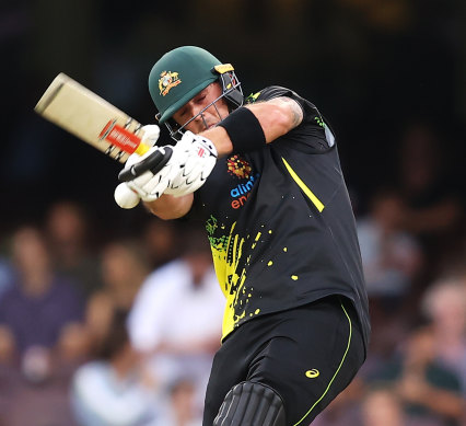 Ben McDermott takes the long handle to the Sri Lankan attack at the SCG on Friday night.