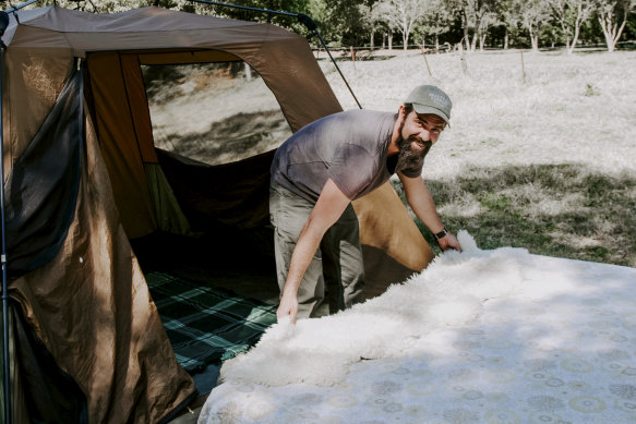 Ben Gray sorts out the tent. 