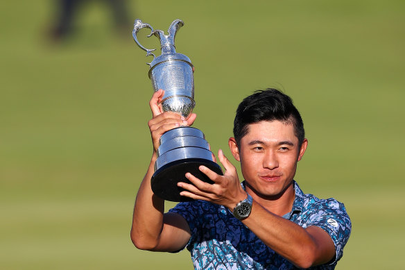 Open Champion Collin Morikawa raises the famous Claret Jug at Royal St George’s Golf Club on Sunday.