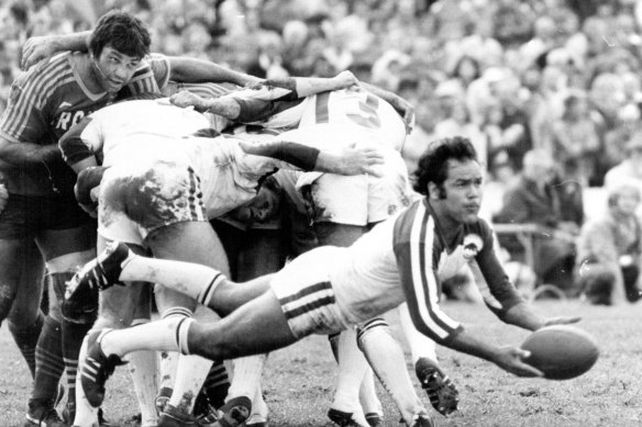Terry Wickey clears a scrum for Penrith in 1979, with Arthur Beetson watching on.