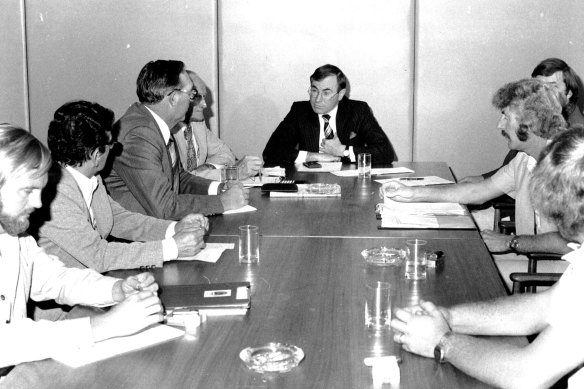 Federal Treasurer, John Howard, pictured in talks with union leaders over the striking miners, a month later.