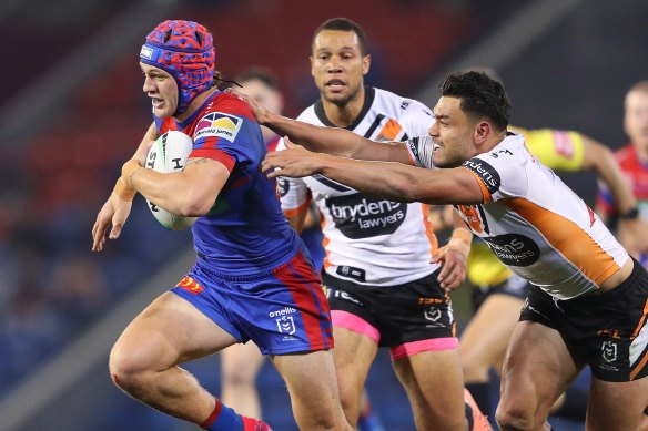 Kalyn Ponga shows the Tigers a clean pair of heels.