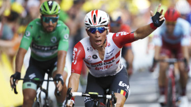 Australia's Caleb Ewan celebrates as he crosses the finish line.