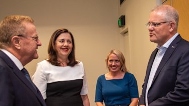 Prime Minster Scott Morrison greets Australian Olympic Committee president John Coates, Queensland Premier Annastacia Palaszczuk and state Tourism Minister Kate Jones in Cairns last week.