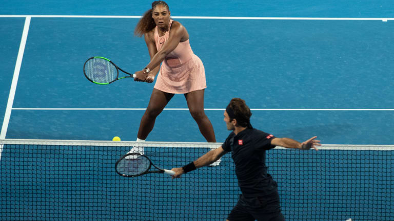 Serena Williams and Roger Federer in action during the mixed doubles match between Switzerland and the US.