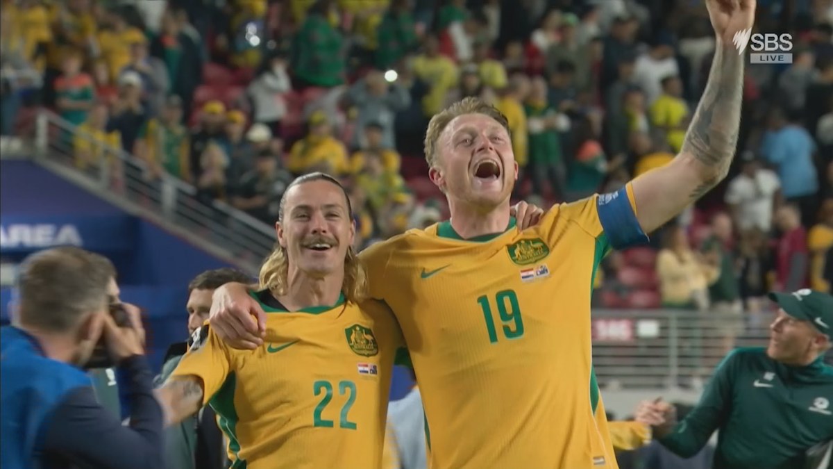 Socceroos advance to knockouts after surviving late Paraguay fright