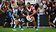 Daniel Tupou scores for the Roosters.