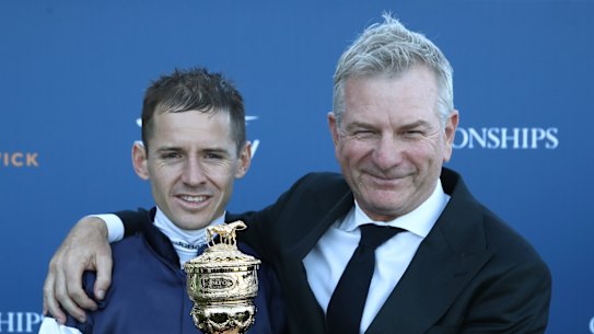 Jason Collett and Kris Lees with the Sydney Cup.