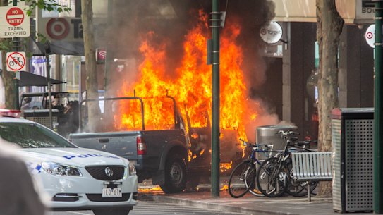 A general view of the scene on Bourke Street where a man has been shot by police after setting his car alight and stabbing multiple people in Melbourne's CBD