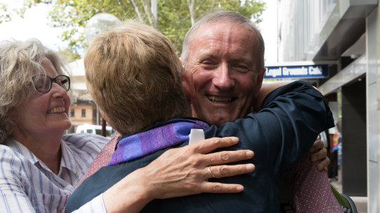 Anthony and Diana Berecry embrace Julie Lyford after the court ruling.