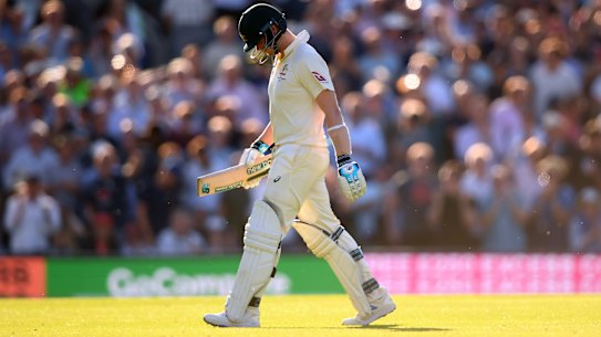 Steve Smith leaves the pitch after getting out lbw.