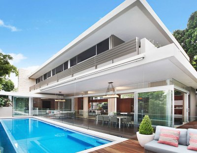 Luxury house with one of Sydney’s more intriguing back-stories sells for $13.9m at auction