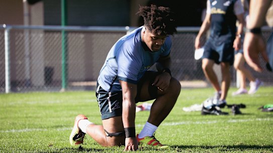 Rob Valetini on his knees at Wallabies training. 