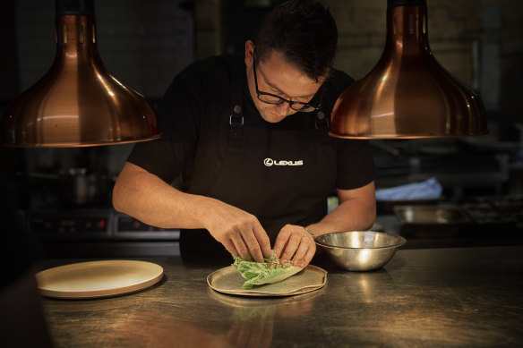 Chef Charlie Carrington is cooking in the LANDMARK by Lexus marquee.